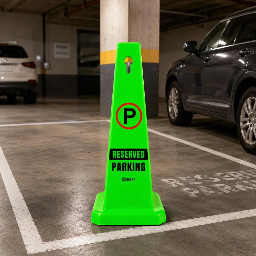 green reserved parking cone for parking area identification
